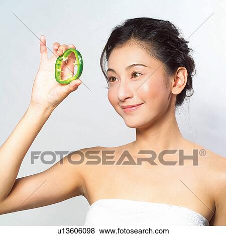 Tube Top, Holding, Dieting, One Young Woman Only, Head And Shoulders, Human Face View Large Photo Image Stock Photo - Tube Top, Holding, Dieting, One Young Woman Only, Head And Shoulders, Human Face. Fotosearch