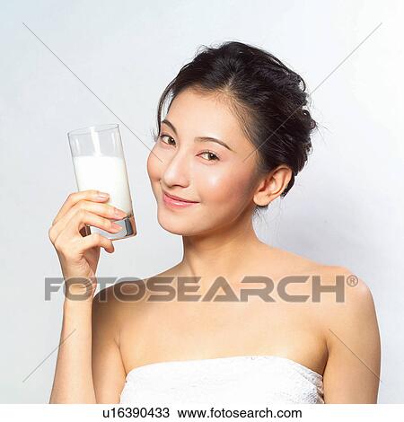 Young Adult, Hair Back, Smiling, Asian Ethnicity, Indoor View Large Photo Image Stock Image - Young Adult, Hair Back, Smiling, Asian Ethnicity, Indoor. Fotosearch