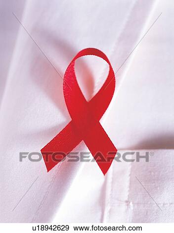 social awareness symbol, aids, healthcare and medicine, fabric, red, alertness, pocket View Large Photo Image Stock Photo - social awareness symbol, aids, healthcare and medicine, fabric, red, alertness, pocket. Fotosearch