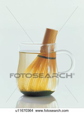 Picture - grip, liquid, dipped, close-up, china, table ware, traditional. Fotosearch