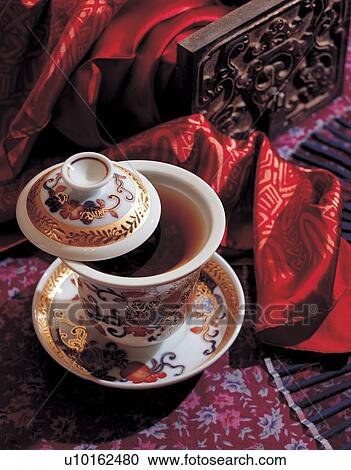 Stock Image - preparation, clayware, dishware, lid, drink, beverage, tea. Fotosearch