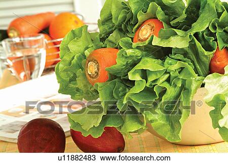 Edible, Table, Orange, Green, Glass View Large Photo Image Stock Image - Edible, Table, Orange, Green, Glass. Fotosearch