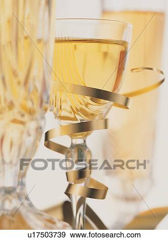 Glass, Stem, Alcohol, Ribbon, Close-Up View Large Photo Image Stock Photo - Glass, Stem, Alcohol, Ribbon, Close-Up. Fotosearch