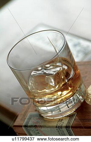 Stock Photo - Hard Liquor, Tilt, Wineglass, Indoor, Half Full, Wine, Drink. Fotosearch