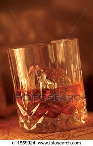 Picture - Tilt, Clear, Luxury, Glass, Half Full, Ice Cube. Fotosearch