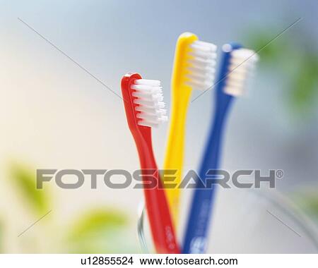 Picture - Close Up Image of Three Toothbrushes, Close Up, Differential Focus. Fotosearch