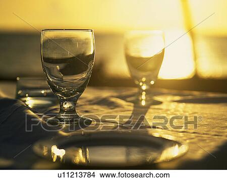 Picture - Glass that is Reflecting Sunlight, Side View, Close Up. Fotosearch