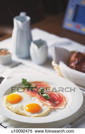 Stock Photography - Ham and Eggs, High Angle View, Differential Focus. Fotosearch