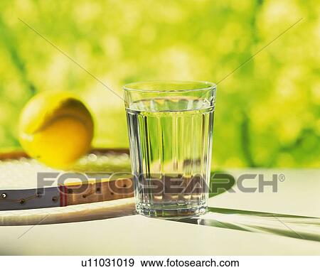 Tennis Ball and Glass, Side View, Close Up, Differential Focus View Large Photo Image Stock Photo - Tennis Ball and Glass, Side View, Close Up, Differential Focus. Fotosearch