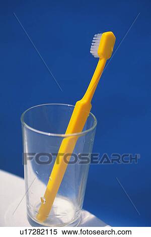 Stock Photography - Toothbrush and Glass, High Angle View. Fotosearch
