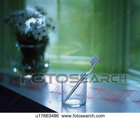 Stock Photograph - Toothbrush that is at the Window, Side View, Differential Focus. Fotosearch