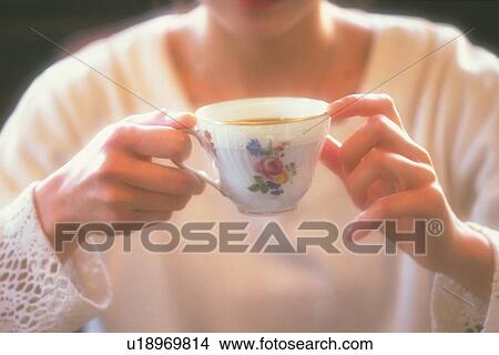 Picture - Woman Drinking a Coffee, Front View, Soft Focus. Fotosearch