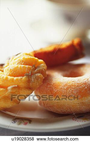 Stock Photo - Doughnut Served on the Plate, Side View. Fotosearch