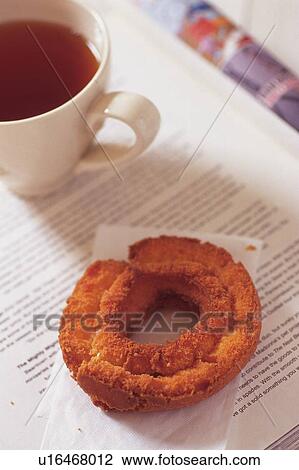 Doughnut Served with Tea, High Angle View View Large Photo Image Stock Image - Doughnut Served with Tea, High Angle View. Fotosearch