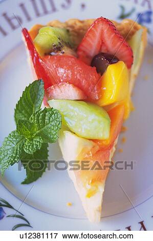 Stock Photo - Fruit Cake on the Plate, Close Up. Fotosearch