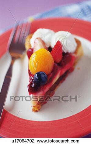 Stock Image - Fruit Cake on the Plate, High Angle View. Fotosearch