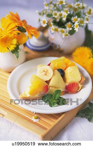 Stock Photo - Fruit Cake on the Plate, High Angle View. Fotosearch