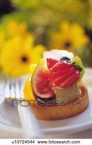 Picture - Fruit Cake on the Plate, Side View. Fotosearch