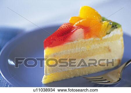 Picture - Fruit Cake on the Plate, Side View. Fotosearch