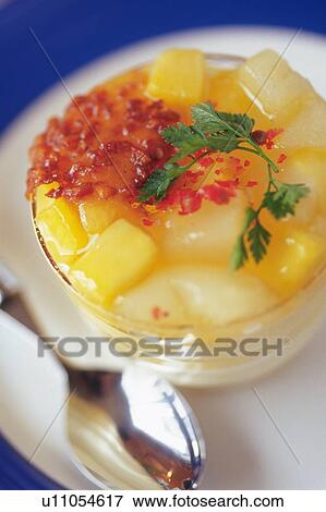 Stock Photo - Fruit Dessert on the Plate, Close Up. Fotosearch