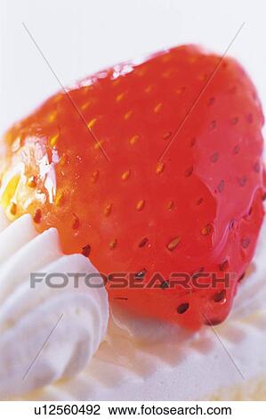 Stock Image - Strawberry on the Cake, Close Up. Fotosearch