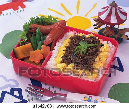 Stock Image - Lunch Box, Rice Topped with Minced Meat and Scrambled Egg, High Angle View. Fotosearch