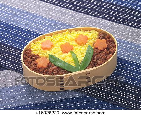 Stock Photo - Lunch Box, Rice Topped with Minced Meat and Scrambled Egg, High Angle View. Fotosearch