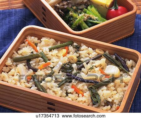 Stock Image - Lunch Box, Rice with Edible Wild Plants, Close Up. Fotosearch