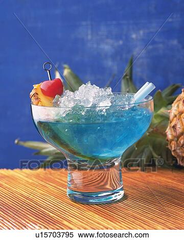 Stock Photography - Cocktail, Blue Hawaii, Front View, Differential Focus. Fotosearch