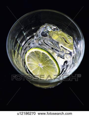 Stock Image - Cocktail, White Rum on the Rock, High Angle View. Fotosearch