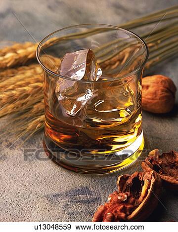 Stock Photo - Whiskey on the Rock, High Angle View, Differential Focus. Fotosearch