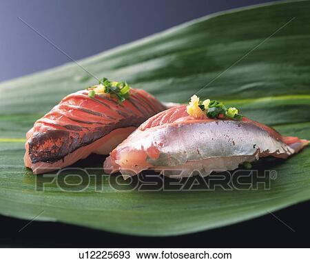 Stock Image - Aji, hand-shaped sushi. Fotosearch
