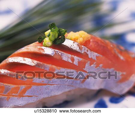 Stock Image - Aji, hand shaped sushi. Fotosearch