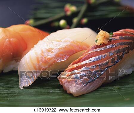 Stock Image - Aji, Hirame, Akagai, hand shaped sushi. Fotosearch