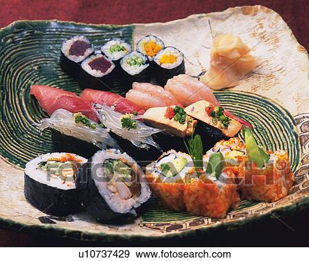 Stock Photo - Assorted sushi, sushi roll and large roll. Fotosearch