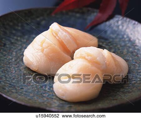 Stock Image - Hotate, hand-shaped sushi. Fotosearch