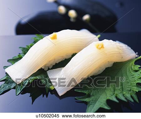 Ika, hand-shaped sushi View Large Photo Image Stock Photography - Ika, hand-shaped sushi. Fotosearch