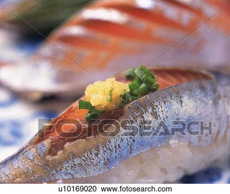 Stock Image - Iwashi, hand-shaped sushi. Fotosearch