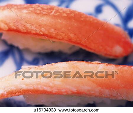 Stock Photo - Kani, hand-shaped sushi . Fotosearch