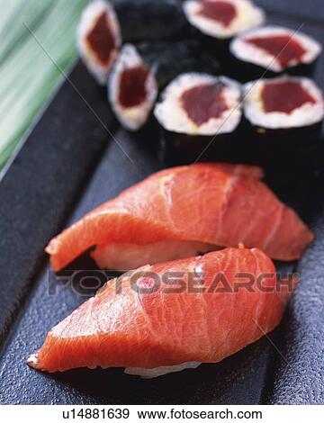 Maguro, hand shaped sushi and sushi roll View Large Photo Image Stock Photo - Maguro, hand shaped sushi and sushi roll. Fotosearch