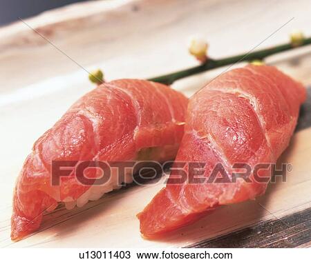 Maguro, hand shaped sushi View Large Photo Image Stock Image - Maguro, hand shaped sushi. Fotosearch
