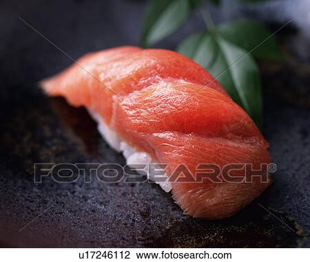 Maguro, hand-shaped sushi View Large Photo Image Stock Image - Maguro, hand-shaped sushi. Fotosearch