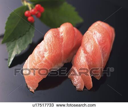 Maguro, hand-shaped sushi View Large Photo Image Stock Image - Maguro, hand-shaped sushi. Fotosearch