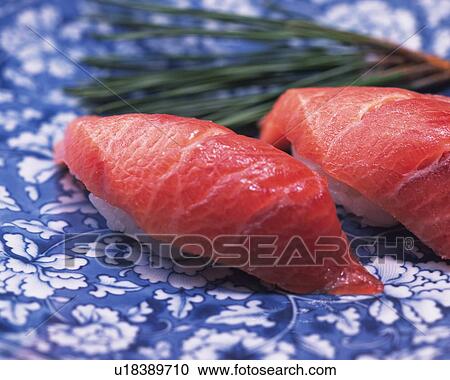 Maguro, hand shaped sushi View Large Photo Image Stock Image - Maguro, hand shaped sushi. Fotosearch