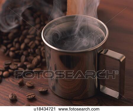 Stock Image - Brend Coffee and Coffee Beans, Full Frame, Differential Focus. Fotosearch