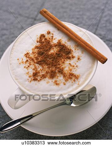 Cappucino with Cinnamon Powder and Cinnamon Stick, High Angle View, Full Frame, Differential Focus View Large Photo Image Stock Image - Cappucino with Cinnamon Powder and Cinnamon Stick, High Angle View, Full Frame, Differential Focus. Fotosearch