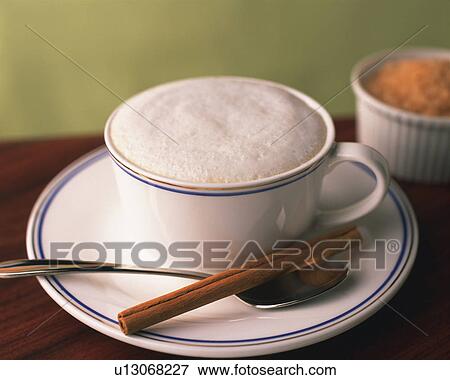 Cappucino with the Cinnamon Stick, Differential Focus, Full Frame View Large Photo Image Stock Photo - Cappucino with the Cinnamon Stick, Differential Focus, Full Frame. Fotosearch