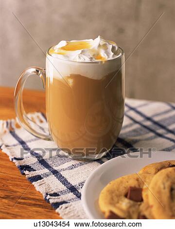 Picture - Caramel Frappetino and Cookie, Differential Focus, Side View, Full Frame. Fotosearch