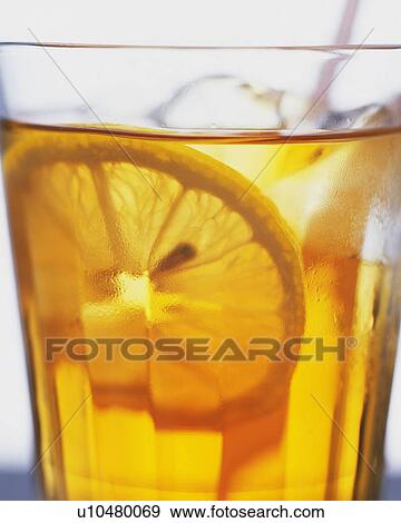 Stock Photo - Close Up Image of Ice Lemon Tea, Close Up, Full Frame, Front View. Fotosearch