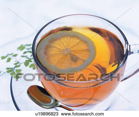 Close Up Image of Lemon Tea in the Tranceparence Cup, High Angle View, Full Frame, Close Up View Large Photo Image Stock Image - Close Up Image of Lemon Tea in the Tranceparence Cup, High Angle View, Full Frame, Close Up. Fotosearch